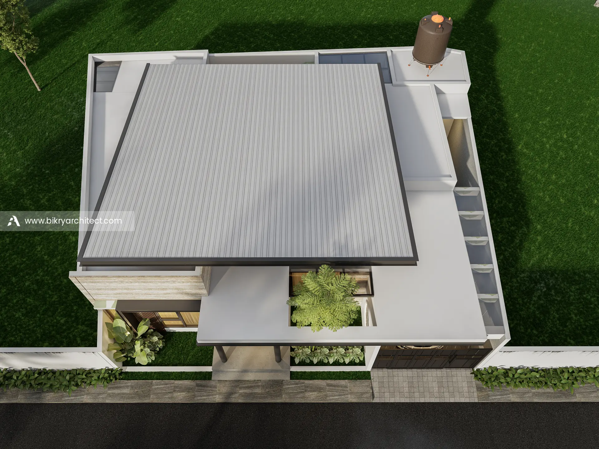 Tampak atas L House Kuningan dengan atap miring, teras, dan taman
