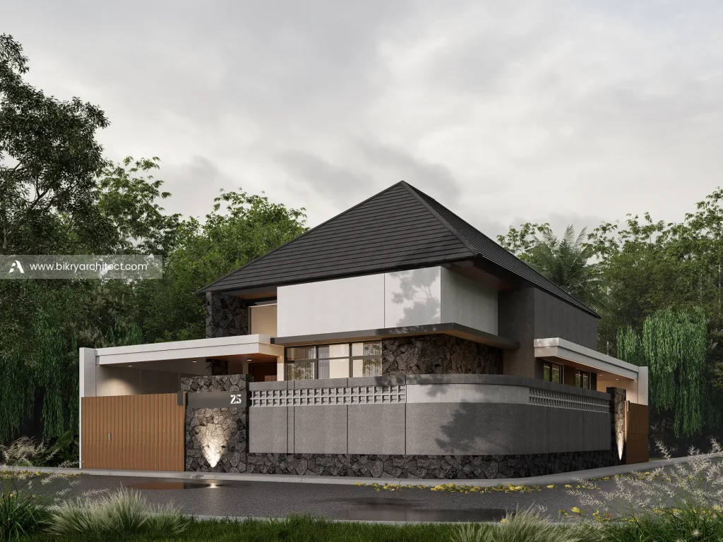 Perspektif sudut N House Jogja, rumah modern tropis 2 lantai dengan atap perisai gelap dan pagar batu alam melengkung