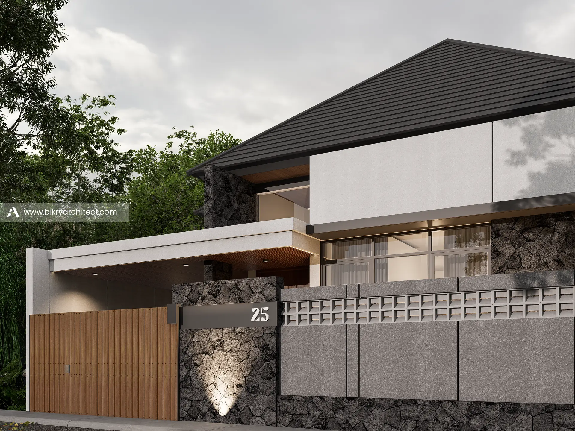 Detail fasad depan dengan kolom batu alam bercahaya, pintu pagar kayu, dan roster di atas pagar