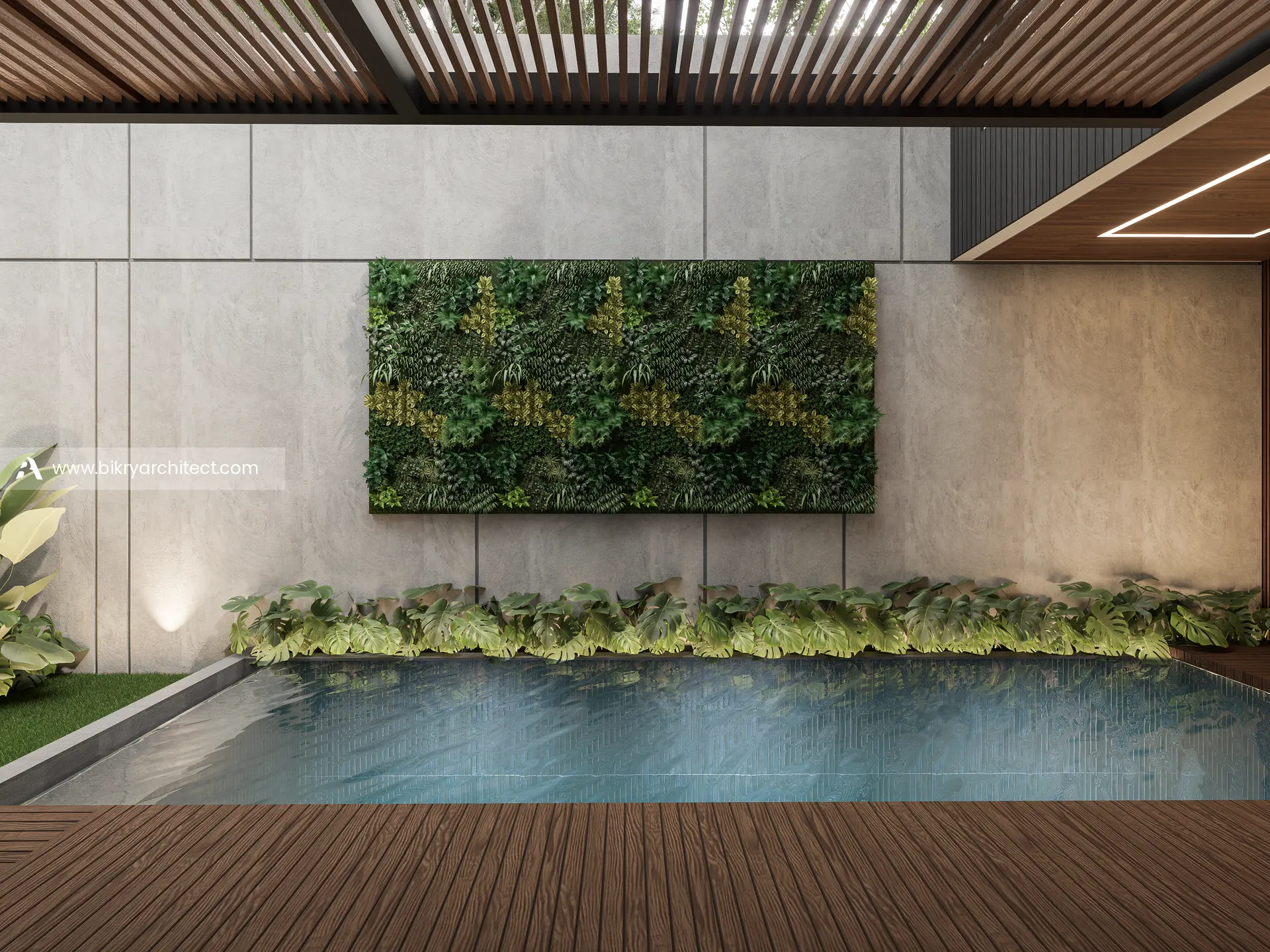 Kolam renang dengan latar dinding vertical garden, lampu sorot, dan dek kayu di bawah pergola